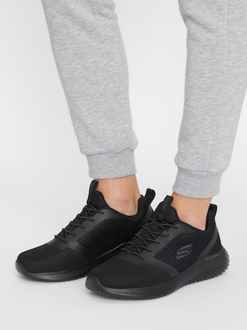 SKECHERS Rövid szárú sportcipők 'Bounder' - fekete: elől
