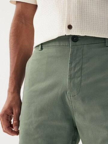 Slimfit Pantaloni chino di Next in verde