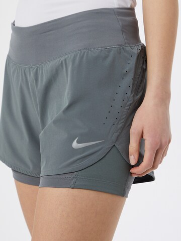 NIKE Regular Workout Pants 'Eclipse' in Grey