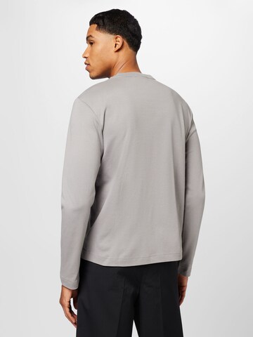 Calvin Klein Bluser & t-shirts i grå