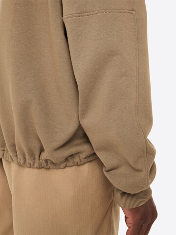 VAUDE Sportsweatshirt 'Redmont' in Bruin