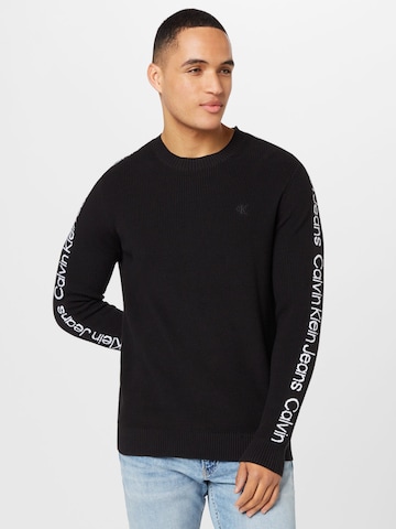 Pull-over Calvin Klein Jeans en noir : devant