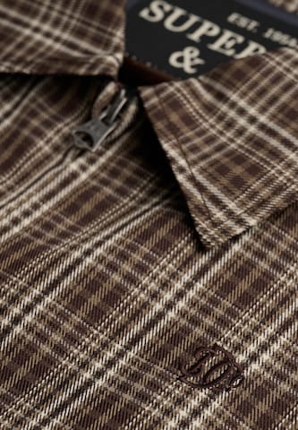 Superdry & Co Tussenjas in Bruin