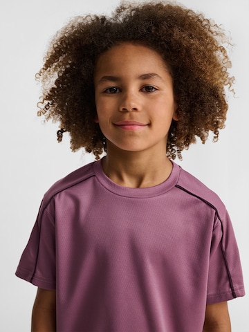 T-Shirt fonctionnel Hummel en rose