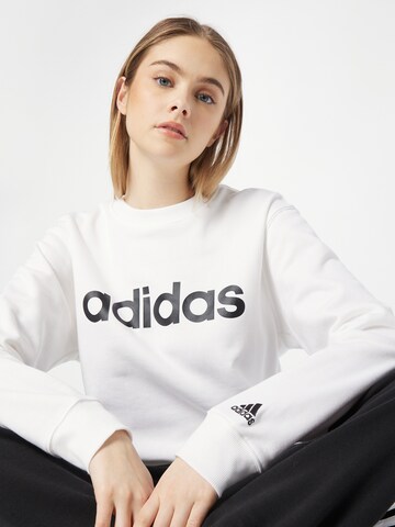 ADIDAS SPORTSWEAR Sportsweatshirt 'Essentials Linear French Terry' in Weiß