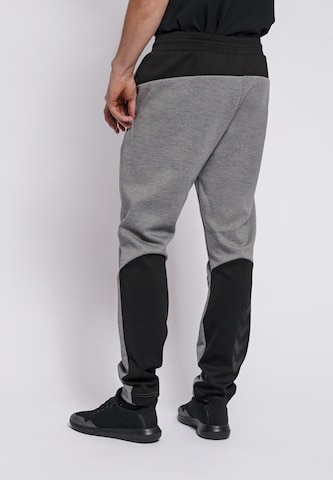 Regular Pantalon de sport 'Tropper' Hummel en gris