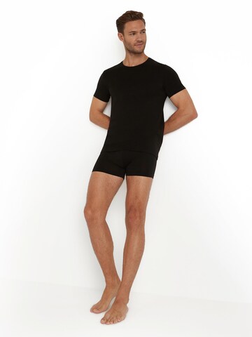 FALKE Unterhemd‌‌‌‌‌‌‌ in Schwarz