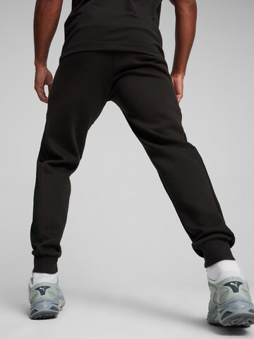 Tapered Pantaloni sport de la PUMA pe negru