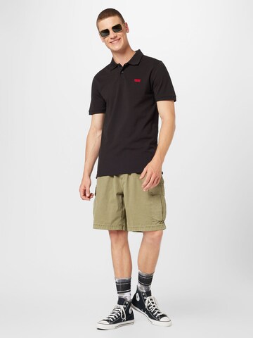 LEVI'S ® Poloshirt 'Housemark' in Schwarz