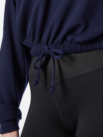 Onzie Athletic Sweatshirt 'Cinch' in Blue