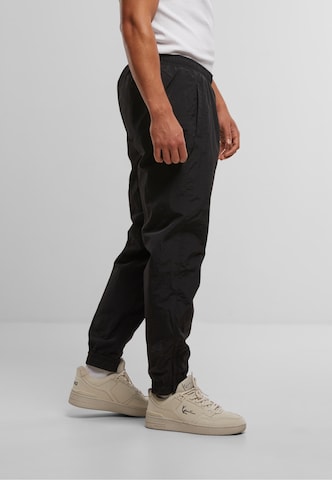 regular Pantaloni di Karl Kani in nero