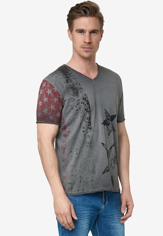 Rusty Neal Cooles T-Shirt mit V-Ausschnitt in Grau: predná strana