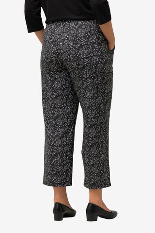 Ulla Popken Flared Pants in Black: front