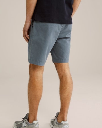 WE Fashion - Regular Calças chino em azul