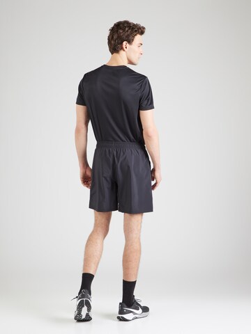 Reebok - regular Pantalón deportivo 'ID TRAIN UTILITY' en negro