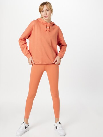 NIKE Skinny Sporthose 'One' in Orange