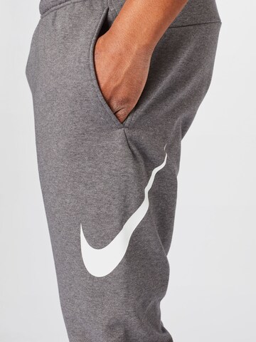 NIKE Конический (Tapered) Спортивные штаны в Серый