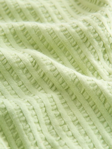 Top di Next in verde