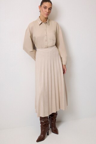 Touche Prive Rock in Beige