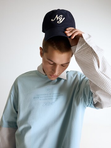 T-Shirt Bershka en bleu