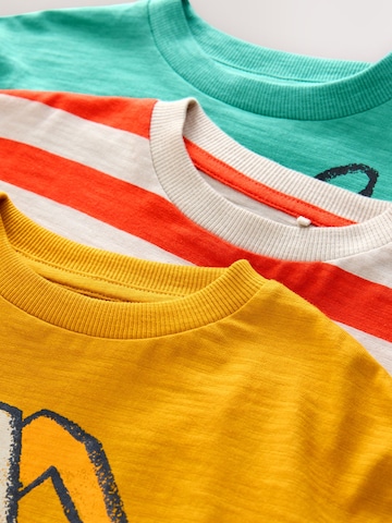 Tricou de la Next pe bej
