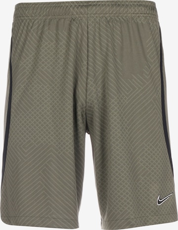 NIKE Workout Pants in Green: front