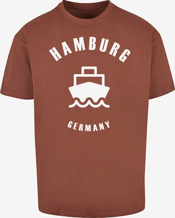 T-Shirt 'Hamburg X' Merchcode en marron : devant