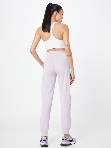 Effilé Pantalon de sport 'LEGACY' Hummel en violet