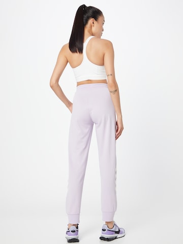 Hummel Ozke Športne hlače 'LEGACY' | vijolična barva