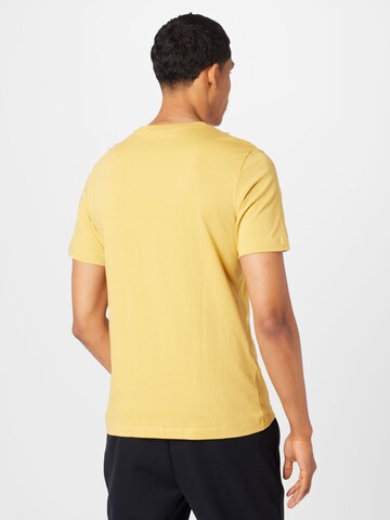 Nike Sportswear - Camiseta en amarillo