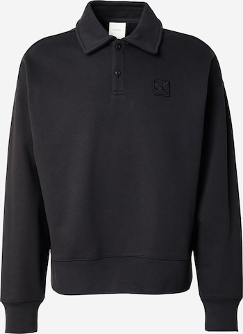 Sweat-shirt Calvin Klein en noir : devant