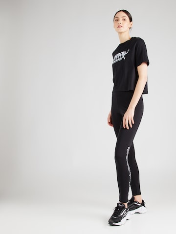 Skinny Pantaloni sportivi 'Rie' di Reebok in nero