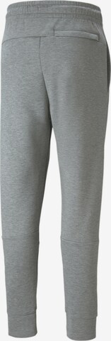 Effilé Pantalon de sport PUMA en gris