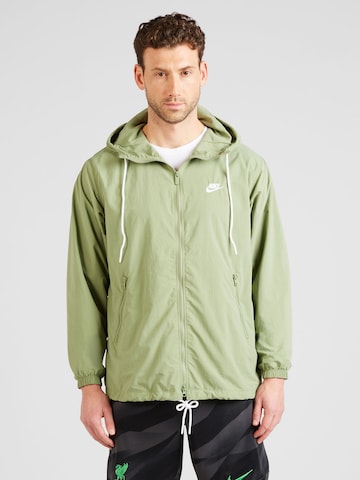 Nike Sportswear Välikausitakki värissä vihreä: edessä