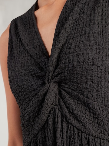 ABOUT YOU Ruha 'Delia' - fekete