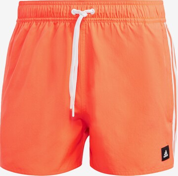 ADIDAS SPORTSWEAR Athletic Swim Trunks in Red: front