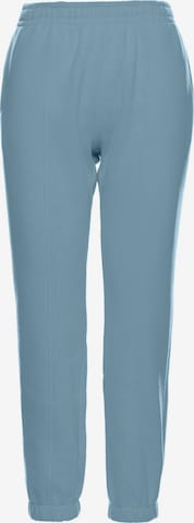 made of emotion - Pantalón en verde: frente