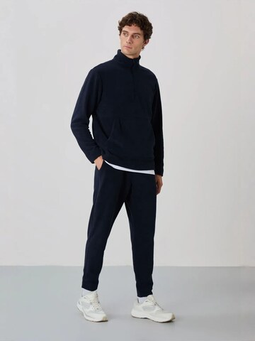 Pantalon Tommy Life en bleu : devant