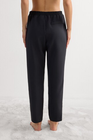 INTIMISSIMI Slimfit Hose in Schwarz