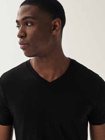 Tricou de la Next pe negru