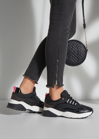 LASCANA Sneakers in Black: front