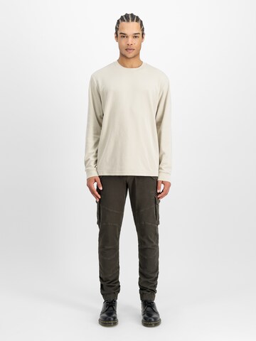 ALPHA INDUSTRIES Tapered Cargo trousers 'Combat' in Brown: front