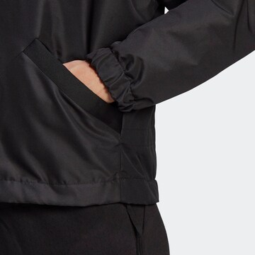 ADIDAS PERFORMANCE Skinny Athletic Jacket in Black