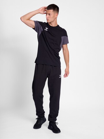 Hummel Regular Workout Pants 'TRAVEL' in Black