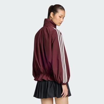 ADIDAS ORIGINALS - Chaqueta de entretiempo en rojo