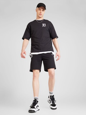 Regular Pantaloni 'LEAGUE ESSENTIALS' de la NEW ERA pe negru