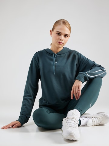 NIKE Skinny Spodnie sportowe 'One' w kolorze zielony