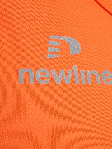 Haut de sport Newline en orange