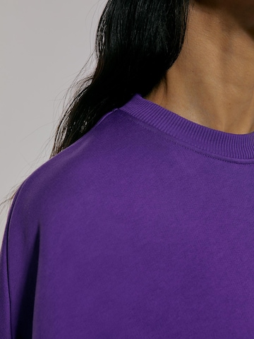 ABOUT YOU x Chiara Biasi Sweatshirt 'Costia' in Purple