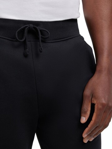 FALKE Regular Workout Pants 'Sweat' in Black